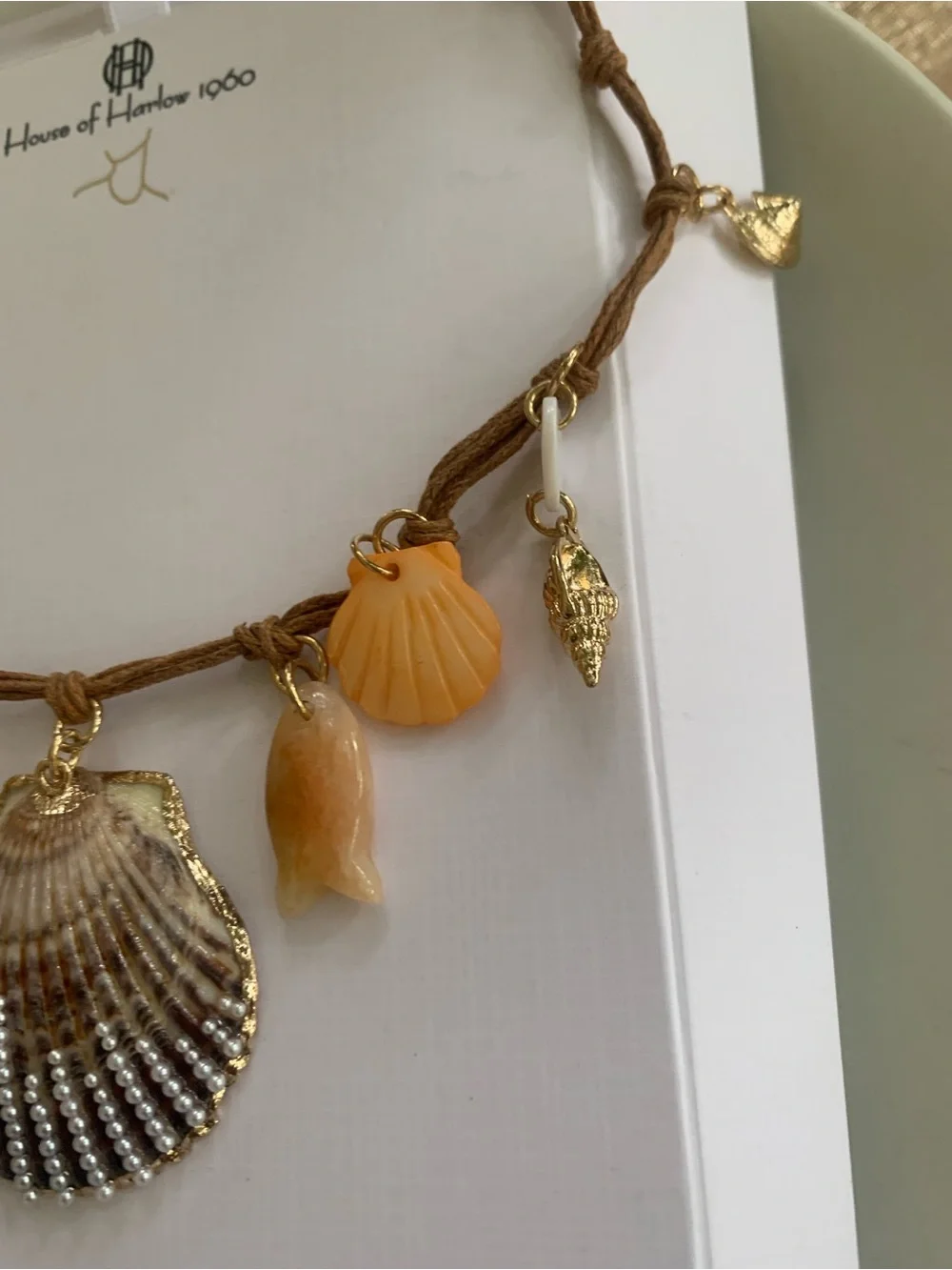 House of Harlow 1960 Brown Cord Shell & Pearl Charm Necklace with Gold Accents
